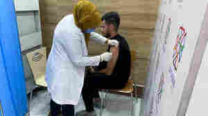 Iraq has enough doses of COVID vaccine for everyone. But many Iraqis don't trust it