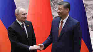 Putin and Xi further their embrace to defy U.S.-led pressure