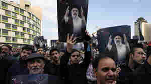 Mourners begin funerals for Iran's president and others killed in helicopter crash