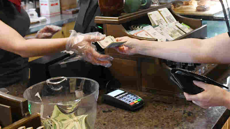 How would banning taxes on tips actually work?
